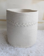 Load image into Gallery viewer, A white rope basket on a rug in front of a white rope basket.

